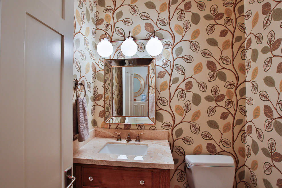 Large transitional powder room in Salt Lake City with an undermount sink, multi-coloured walls, medium wood cabinets and quartzite benchtops.