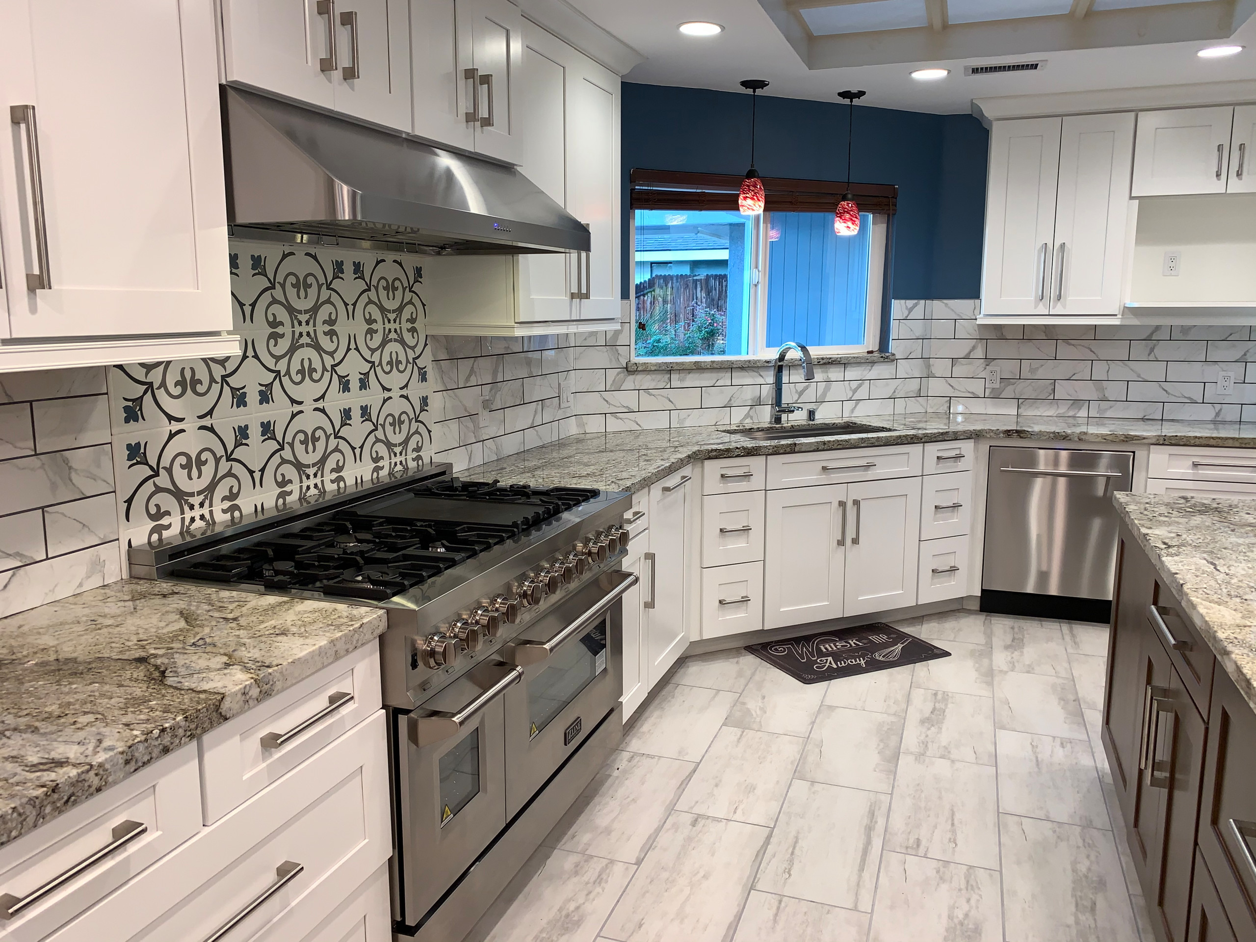 Kitchens featuring a ZLINE Under Cabinet Range Hood