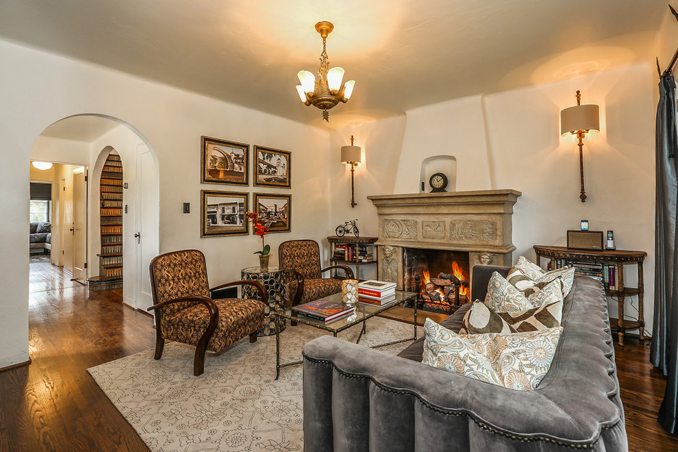 Photo of a mediterranean enclosed living room in Santa Barbara with a standard fireplace.