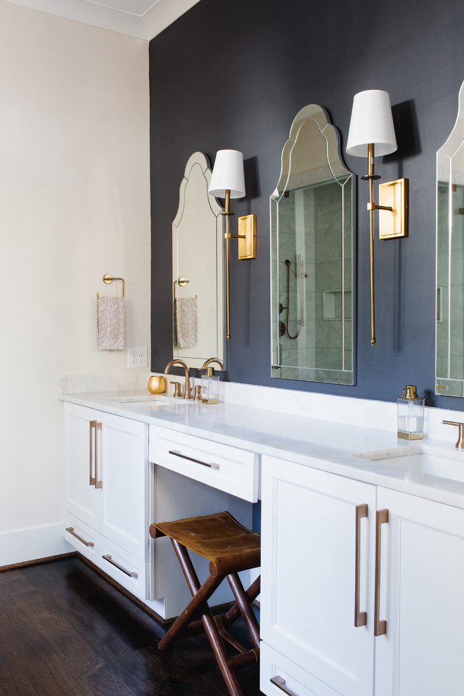 Design ideas for a transitional bathroom in Birmingham with shaker cabinets, white cabinets, blue walls, an undermount sink and white benchtops.