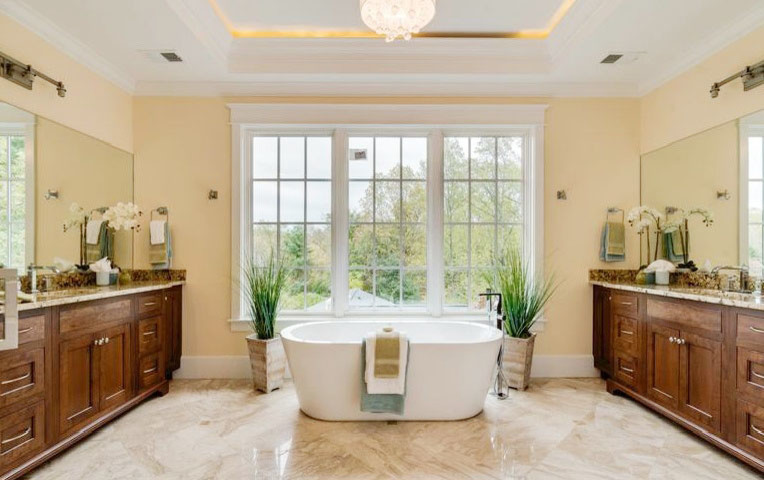 Inspiration for a traditional bathroom in Los Angeles with beige tile and stone tile.