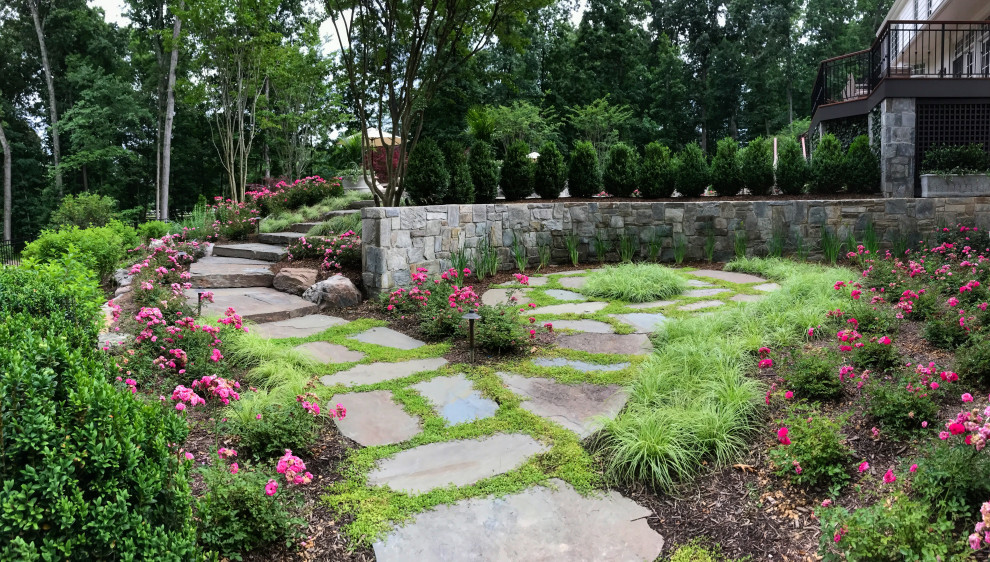 Inspiration for a transitional partial sun stone and stone fence garden path in DC Metro.