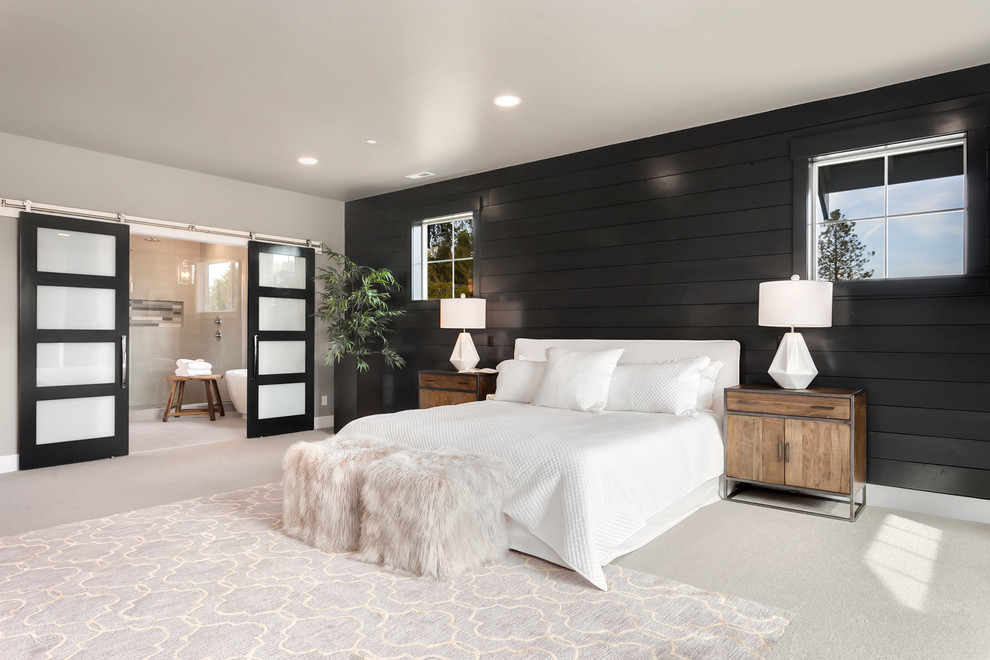 Transitional master bedroom in Seattle with black walls, carpet, no fireplace and grey floor.