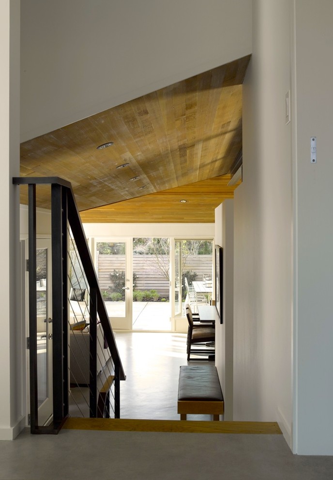 Design ideas for a contemporary hallway in Seattle with white walls.