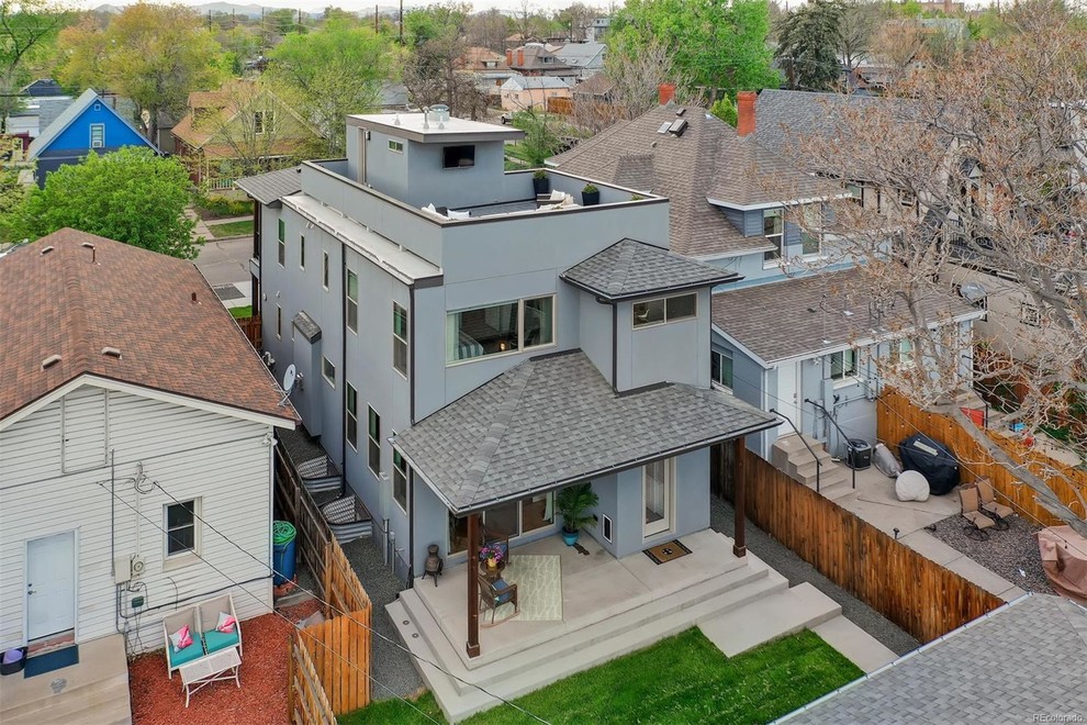 This is an example of a mid-sized contemporary exterior in Denver.