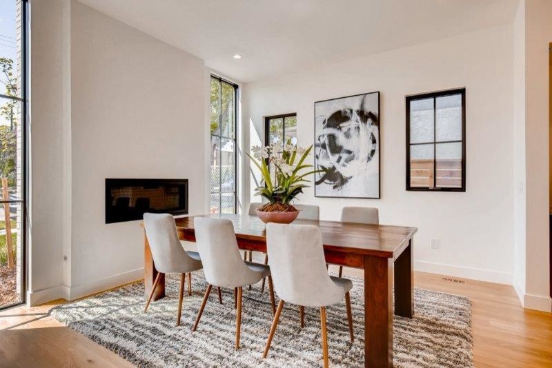 Example of a transitional dining room design in Denver
