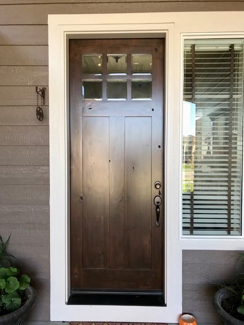 How to hang a wreath on a large wooden front door How to hang a wreath on a large wooden front door