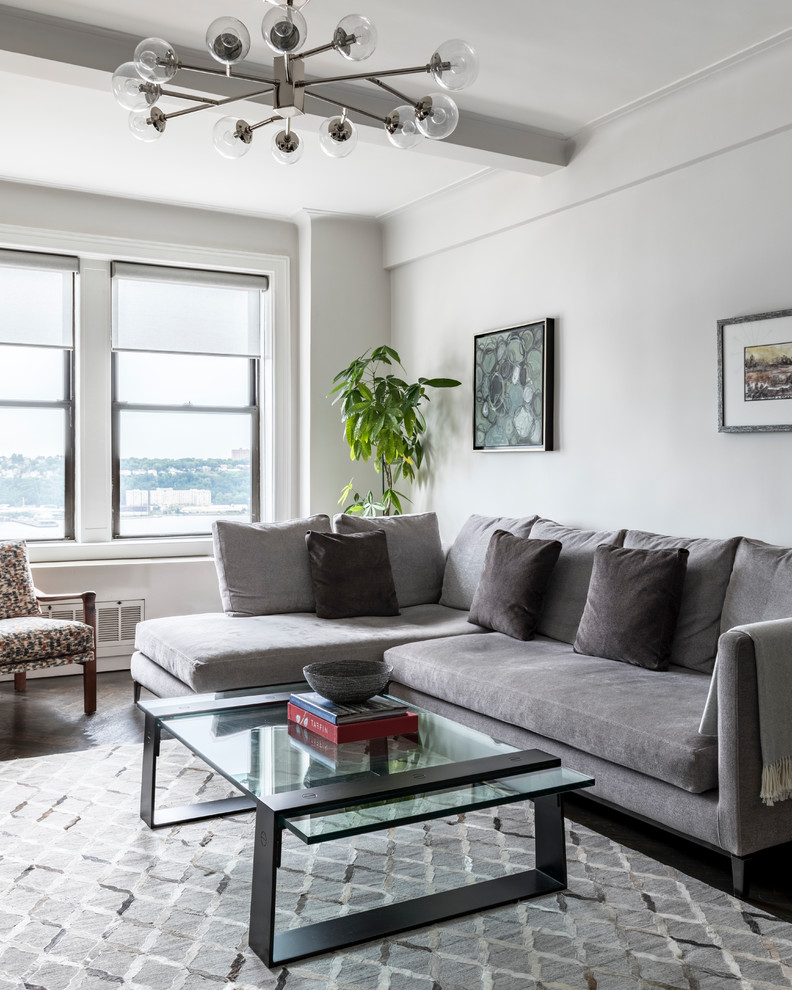 Mid-sized transitional enclosed dark wood floor and brown floor living room photo in Denver with white walls