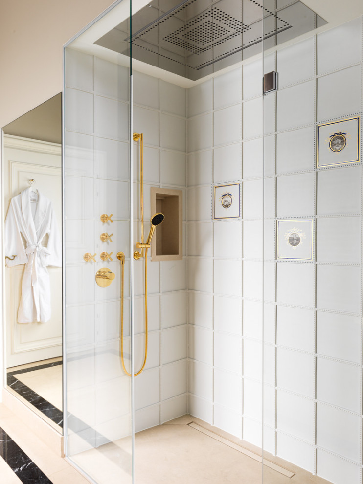 This is an example of a small traditional 3/4 bathroom in Munich with glass-front cabinets, a curbless shower, white tile, ceramic tile, white walls, marble floors, beige floor, a sliding shower screen and a built-in vanity.