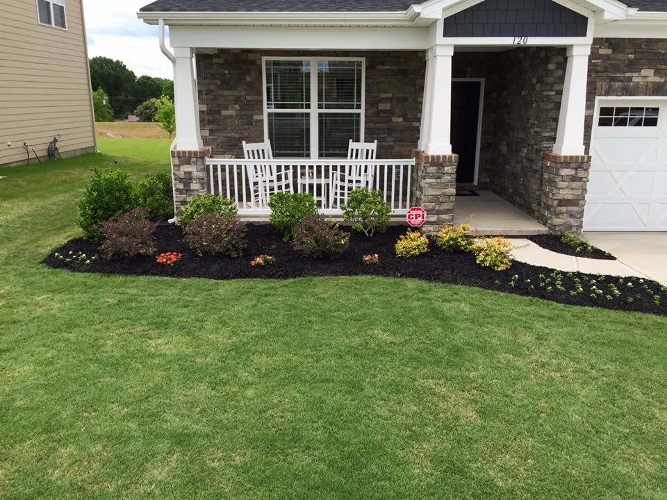 Mid-sized traditional front yard full sun formal garden in Charlotte with a garden path and concrete pavers.
