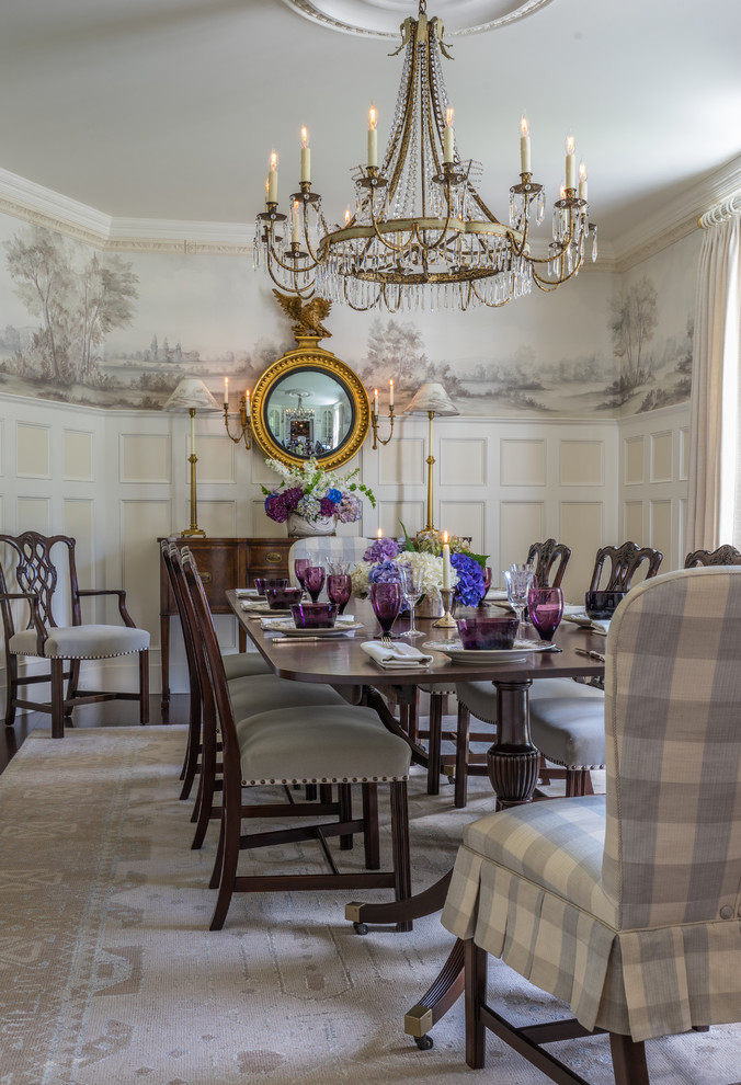 This is an example of a traditional separate dining room in Boston with multi-coloured walls.
