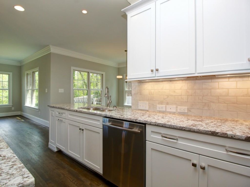 Example of a transitional kitchen design in Raleigh