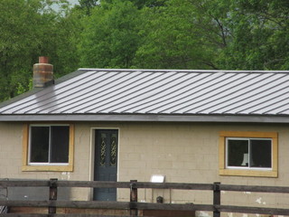 We have a new charcoal grey metal roof... what color siding? - 