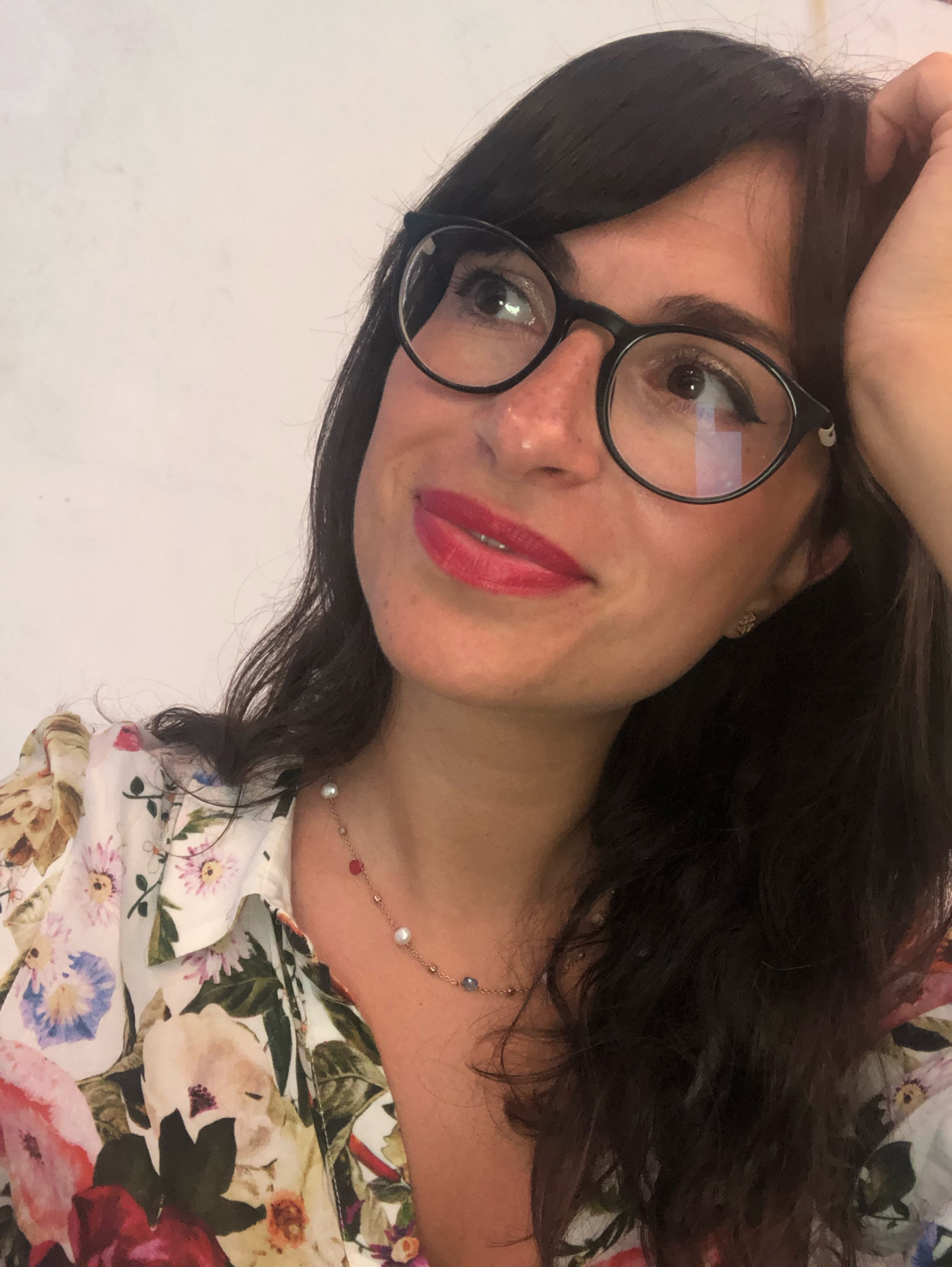 person writing on white paper