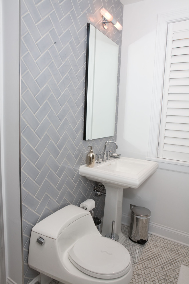 Small traditional 3/4 bathroom in Chicago with an alcove tub, a one-piece toilet, blue tile, white walls, mosaic tile floors, a pedestal sink and subway tile.