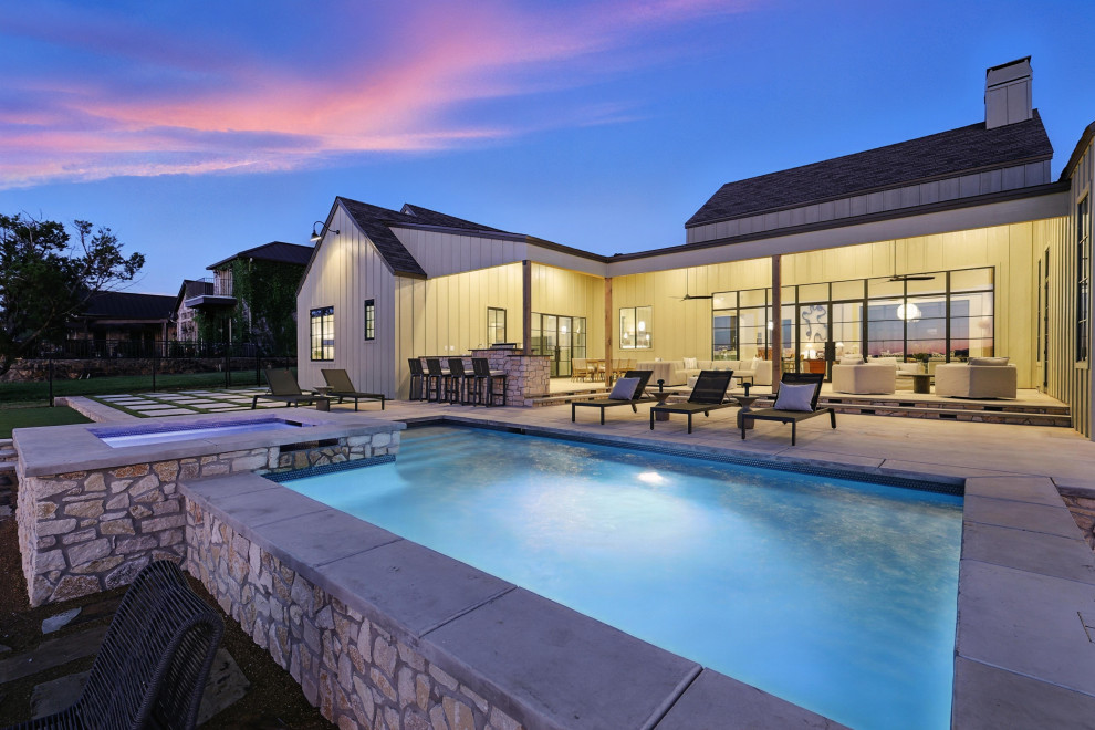 Large minimalist rectangular pool photo in Dallas