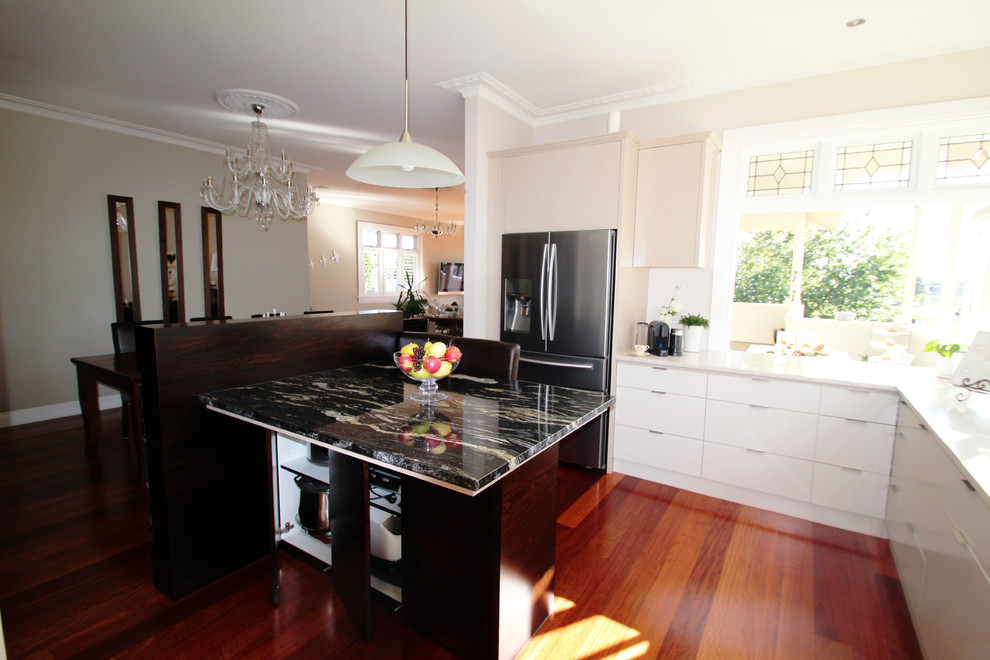 Photo of a mid-sized transitional kitchen in Auckland.