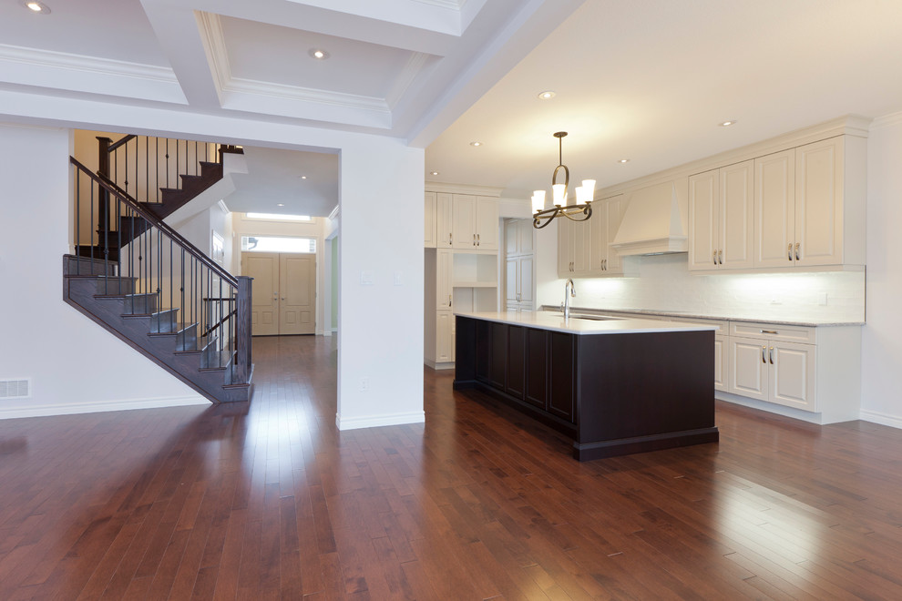 Example of a transitional kitchen design in Toronto