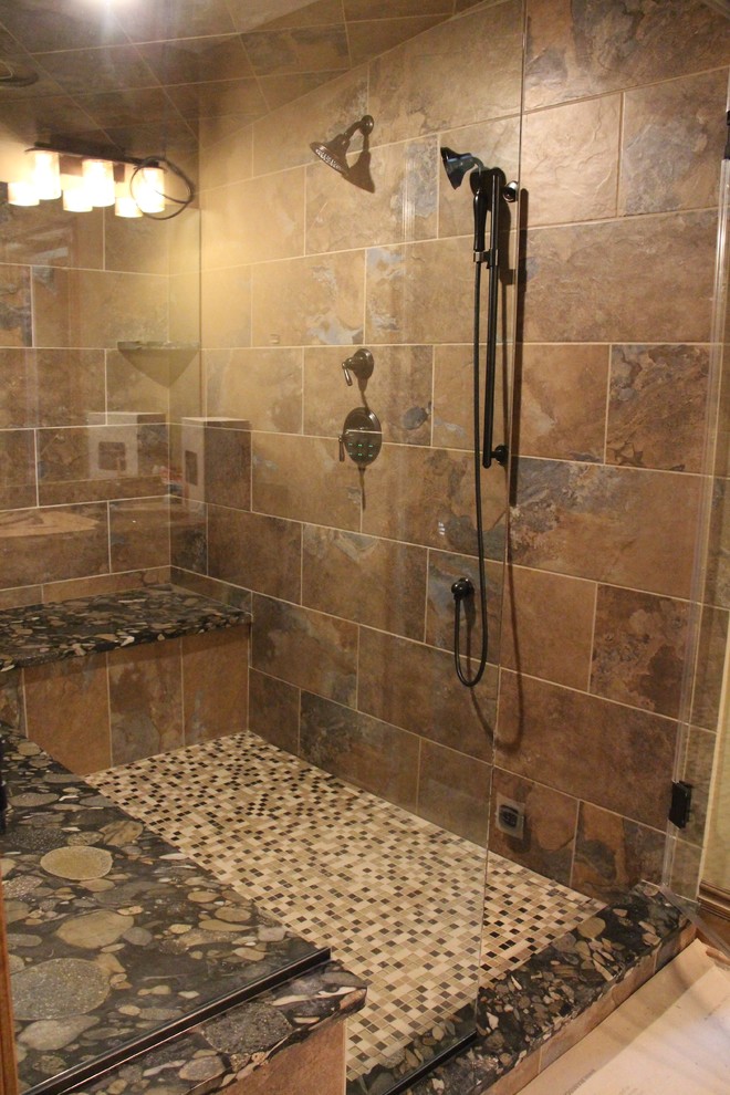 Photo of a large country bathroom in Cleveland with multi-coloured tile, porcelain tile, porcelain floors and granite benchtops.