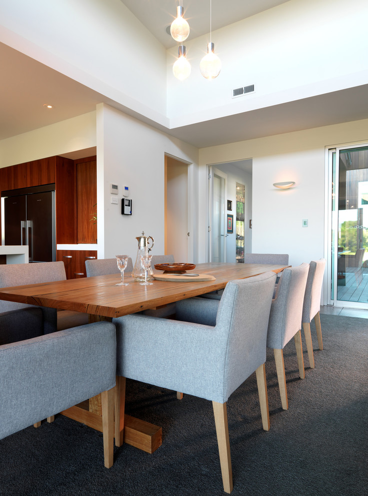 This is an example of a contemporary open plan dining in Melbourne.