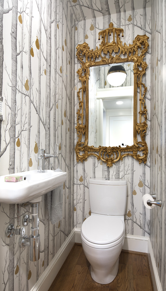 Design ideas for a small traditional powder room in DC Metro with a two-piece toilet, grey walls, medium hardwood floors and a wall-mount sink.