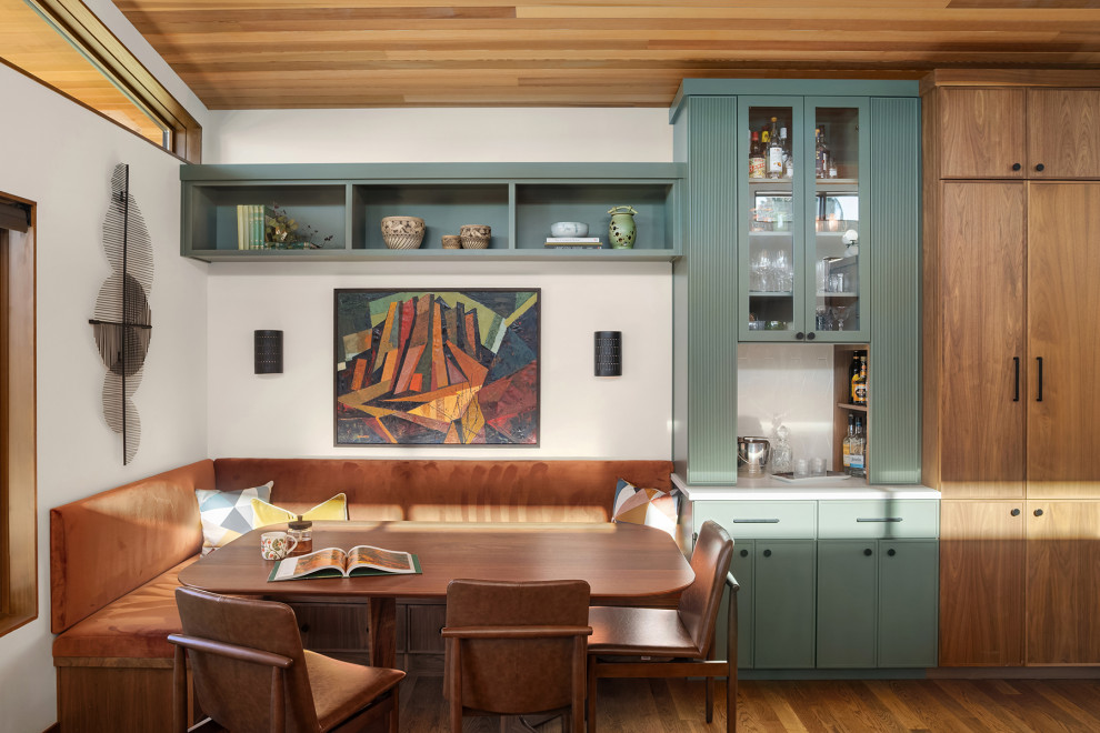 Great room - mid-sized mid-century modern medium tone wood floor, brown floor and wood ceiling great room idea in Seattle with white walls