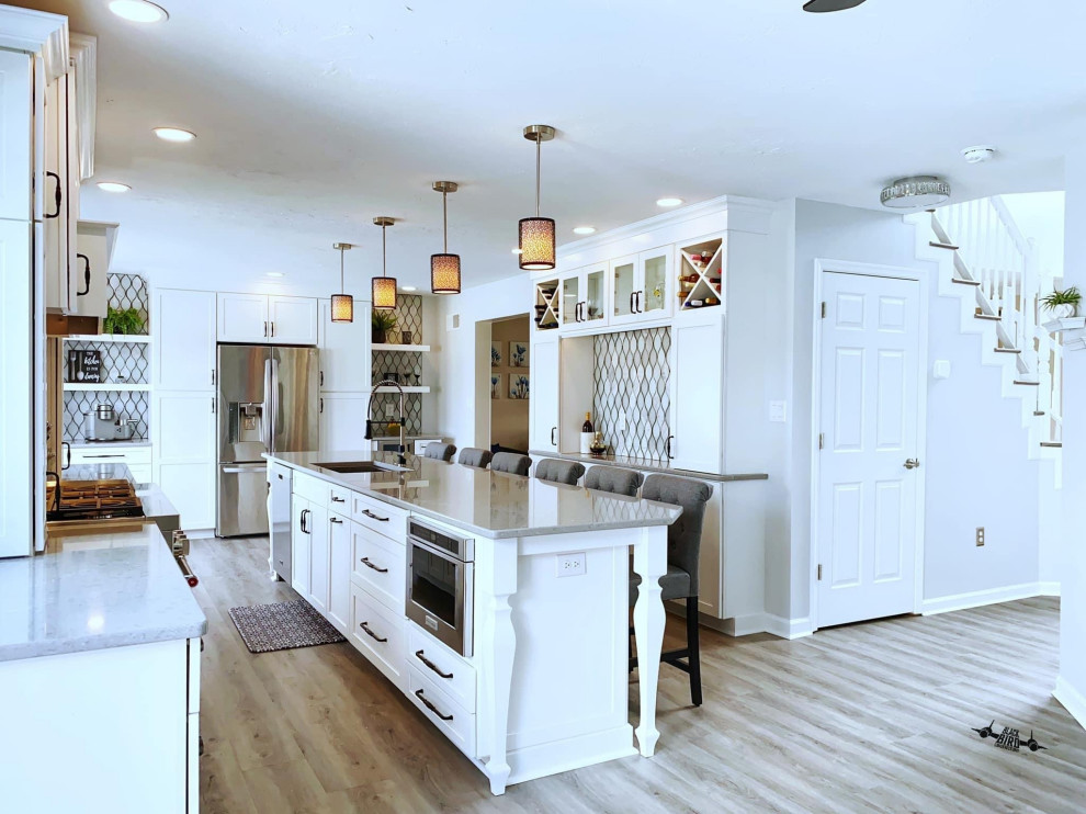 Stunning White Kitchen Remodel with Large Island & Custom Cabinetry