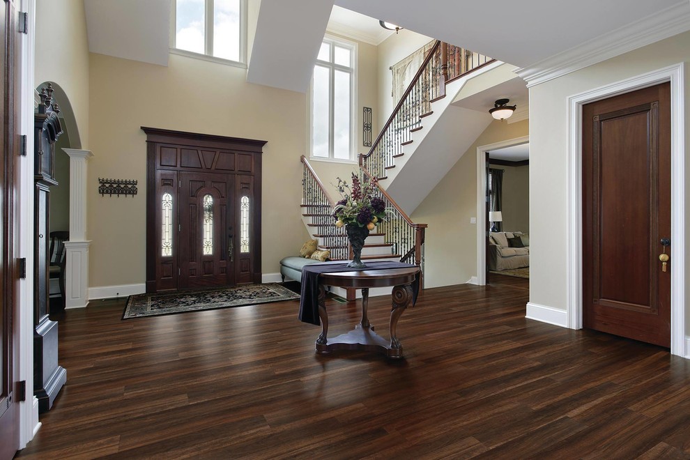 Design ideas for a large traditional front door in San Francisco with vinyl floors, a single front door, a white front door and brown floor.