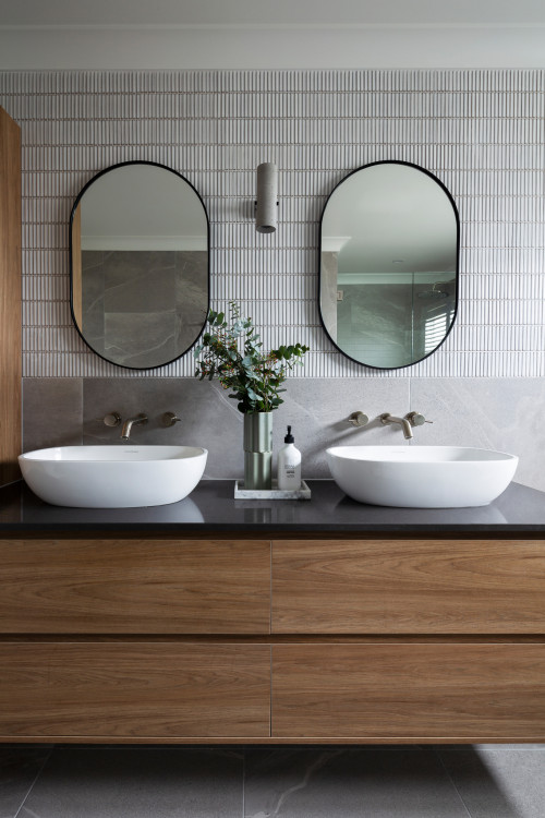 Contemporary Sophistication: Gray Kit Kat Tile Bathroom Backsplash with Black Countertops