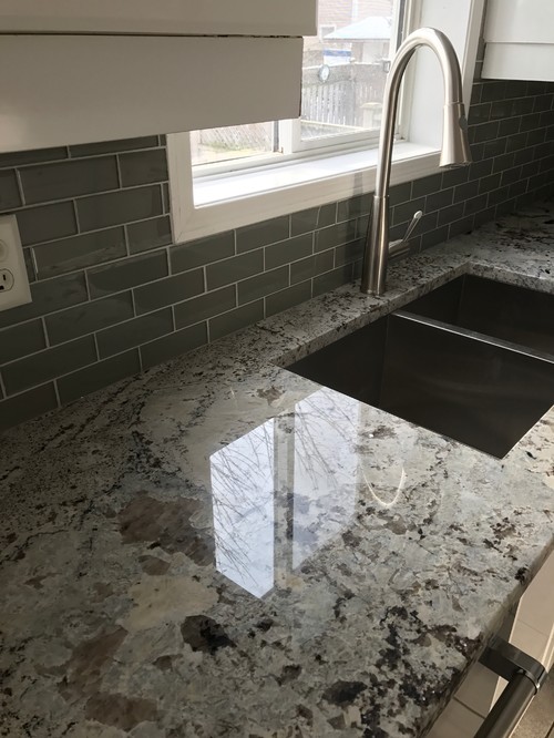Which floor tile matches best with this granite countertop 