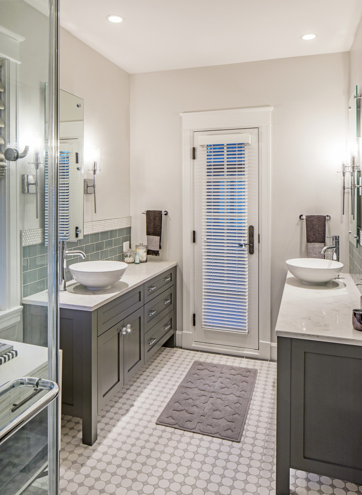Design ideas for a small transitional master bathroom in Omaha with furniture-like cabinets, grey cabinets, a one-piece toilet, white tile, porcelain tile, white walls, porcelain floors, a vessel sink, engineered quartz benchtops, white floor and a hinged shower door.