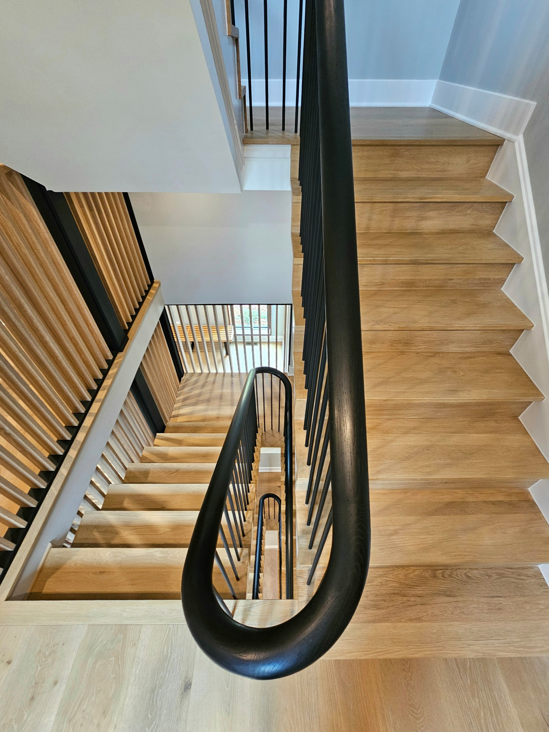115_Stunning Continuous Rail System on 3 Story Floating Stairs; Arlington, VA 22