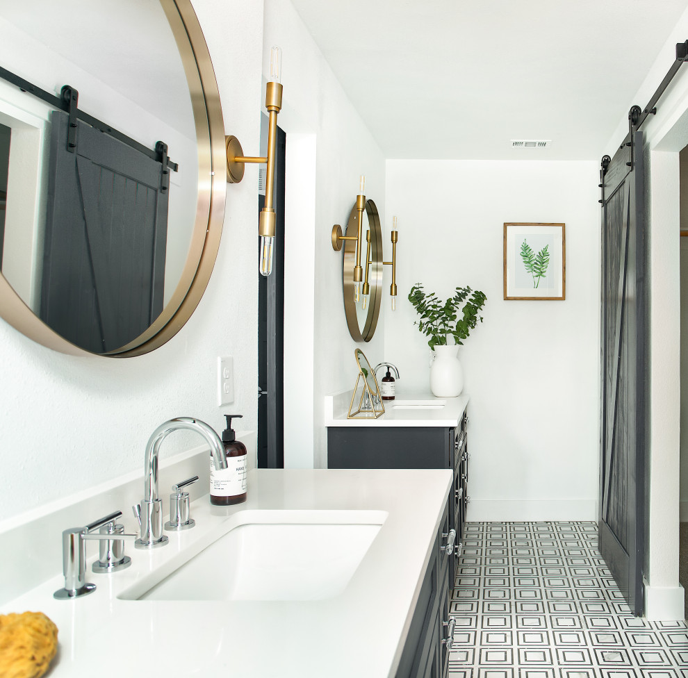 Design ideas for a mid-sized transitional master bathroom in Dallas with shaker cabinets, blue cabinets, white tile, ceramic tile, marble floors, an undermount sink, engineered quartz benchtops and white benchtops.