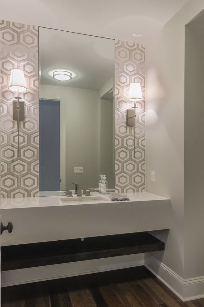 Inspiration for a mid-sized transitional 3/4 bathroom in Detroit with open cabinets, grey cabinets, gray tile, porcelain tile, grey walls, dark hardwood floors, an undermount sink, engineered quartz benchtops, brown floor and white benchtops.