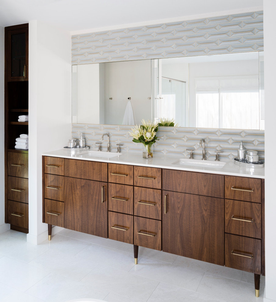 Inspiration for a mid-sized midcentury master bathroom in Houston with white walls, a double vanity, flat-panel cabinets, dark wood cabinets, multi-coloured tile, an undermount sink, white benchtops, a freestanding vanity and grey floor.