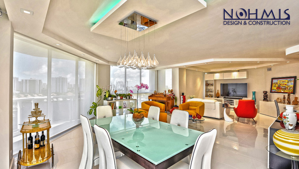 This is an example of a mid-sized modern separate dining room in Miami with white walls, marble floors and no fireplace.