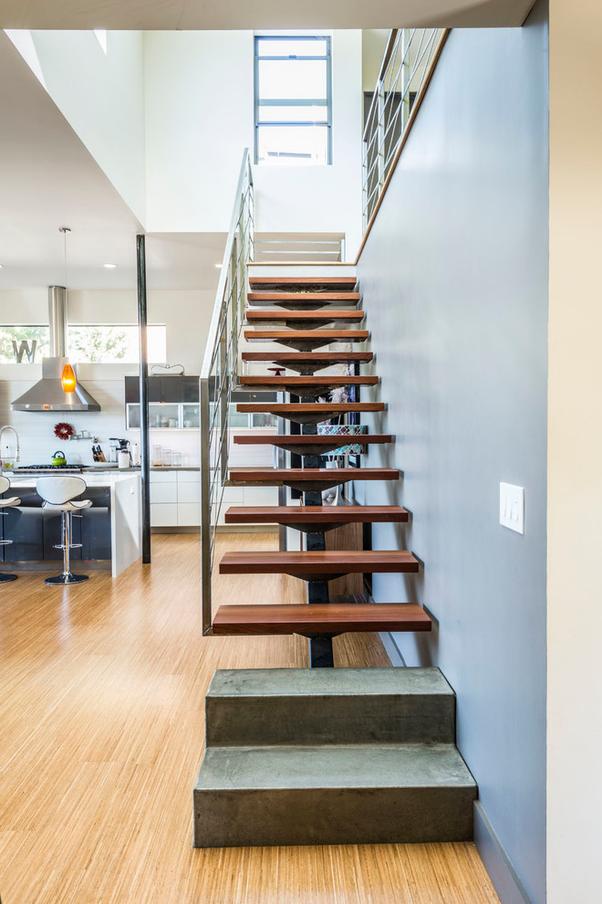 Inspiration for a mid-sized contemporary wood floating staircase in San Francisco with open risers.