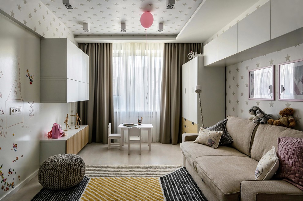 Photo of a contemporary kids' playroom for girls in Novosibirsk with white walls and beige floor.