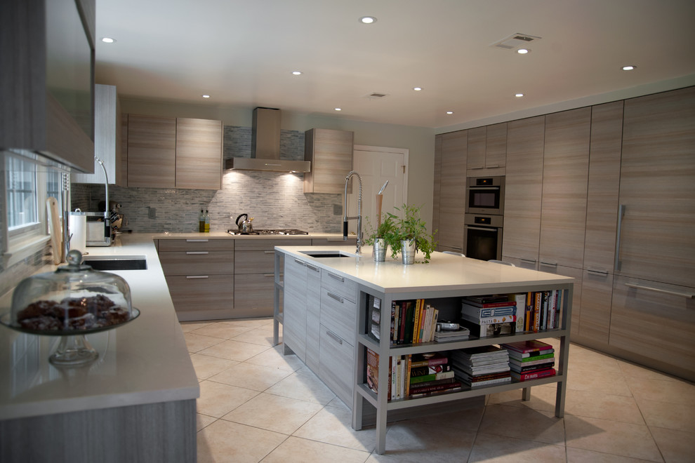Large modern u-shaped separate kitchen in DC Metro with an undermount sink, flat-panel cabinets, light wood cabinets, quartz benchtops, grey splashback, matchstick tile splashback, stainless steel appliances, ceramic floors and with island.