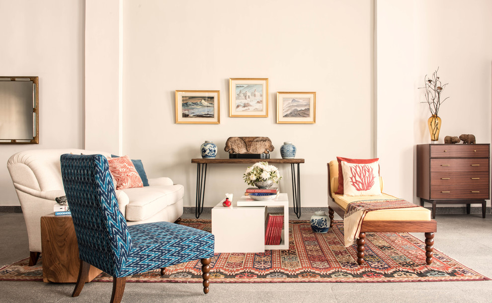 This is an example of a mid-sized eclectic living room in London with beige walls and carpet.
