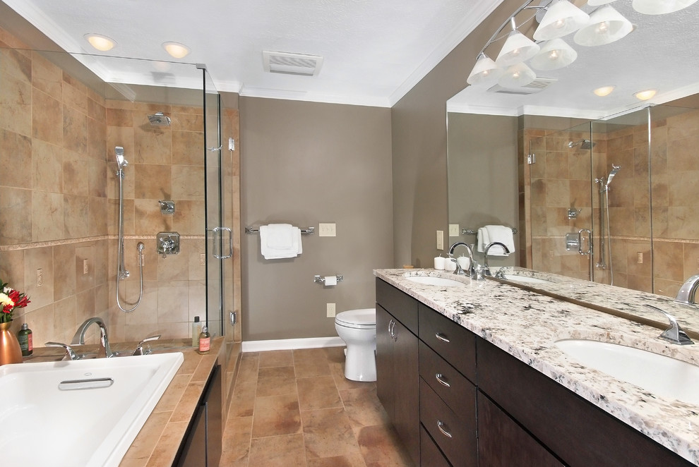 Photo of a mid-sized contemporary master bathroom in Cleveland with flat-panel cabinets.