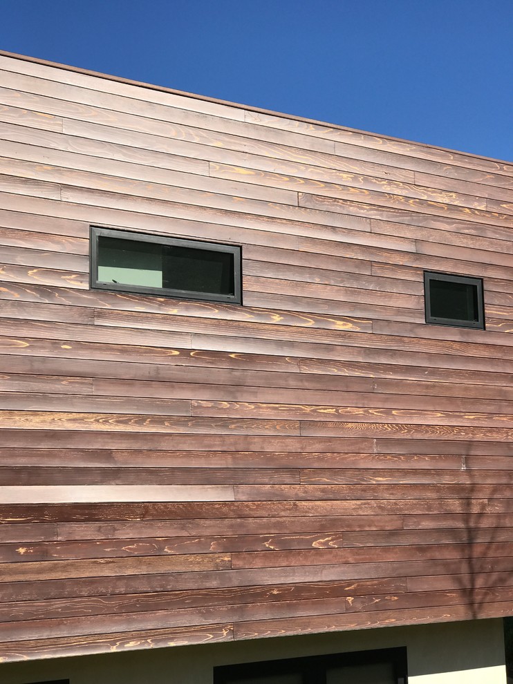 Redwood Siding (southfacing) buckling and fading after 6 months