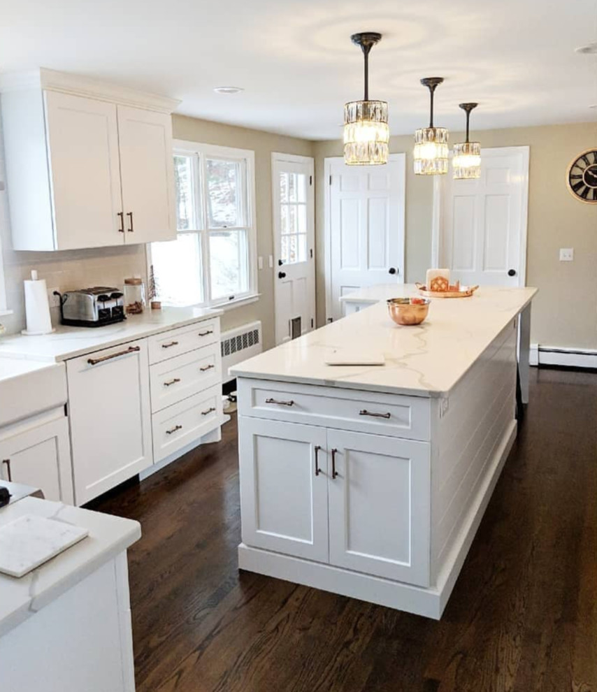Enclosed kitchen - mid-sized transitional l-shaped enclosed kitchen idea with beaded inset cabinets, white cabinets and an island