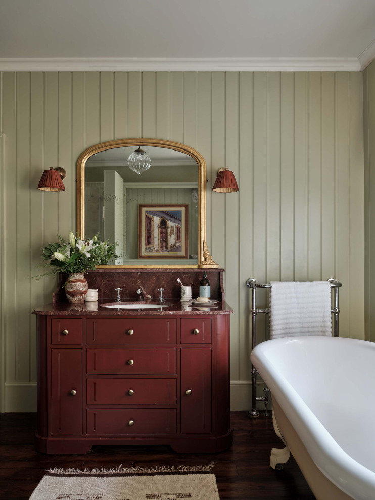 Inspiration for a country bathroom in Buckinghamshire with flat-panel cabinets, red cabinets, a claw-foot bath, green walls, dark hardwood flooring, a submerged sink, brown floors, red worktops, a single sink, a freestanding vanity unit and tongue and groove walls.