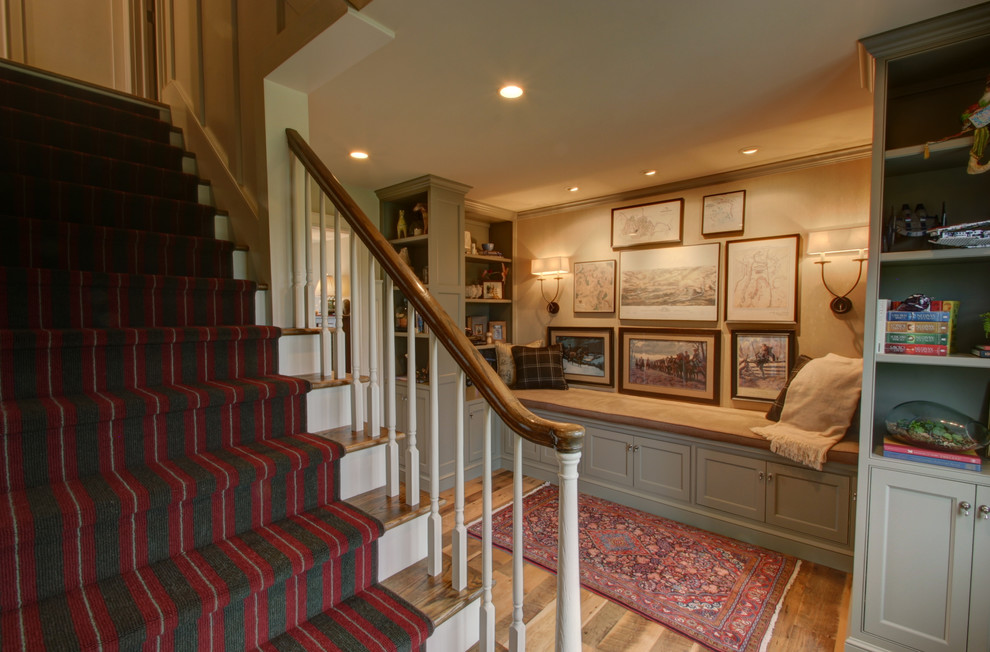 Traditional entry hall in Columbus with beige walls and light hardwood floors.