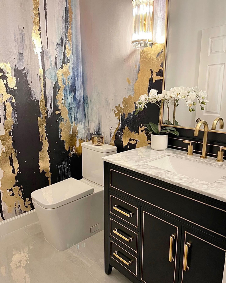 Design ideas for a large modern powder room in Columbus with flat-panel cabinets, black cabinets, a two-piece toilet, marble floors, granite benchtops, grey benchtops, a freestanding vanity and wallpaper.