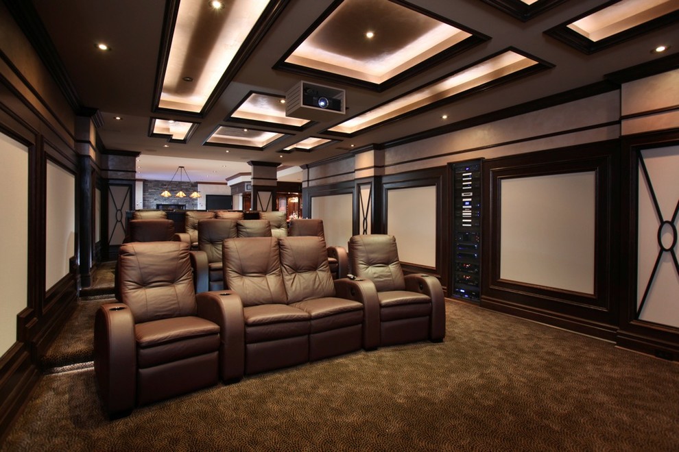 Design ideas for a transitional enclosed home theatre in Toronto with a projector screen.