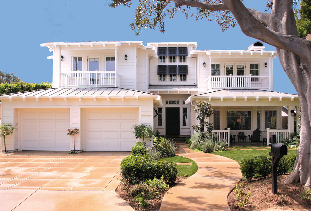 Photo of a tropical two-storey exterior in Orange County.
