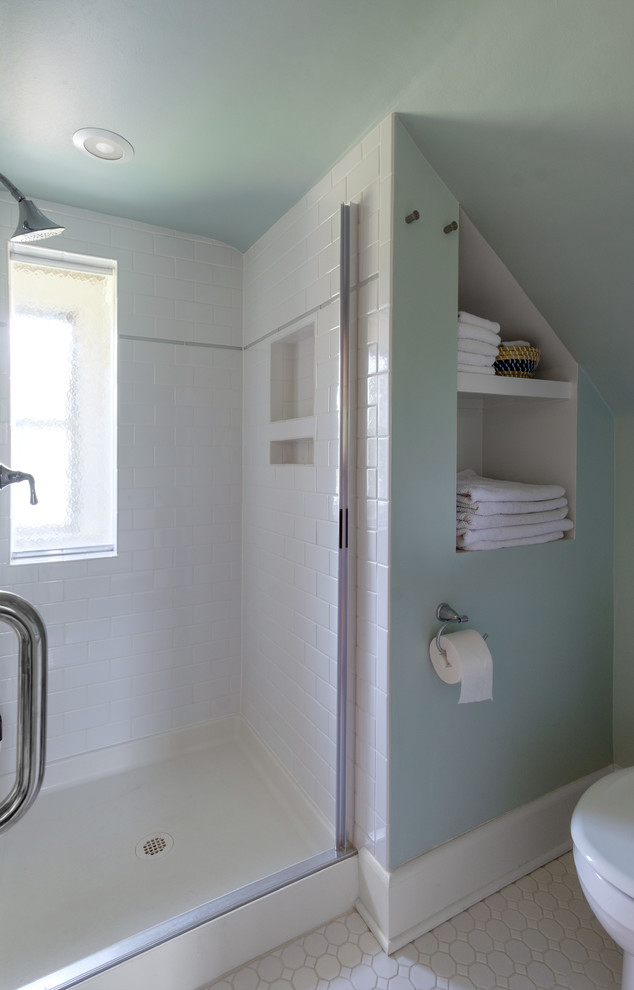 Photo of a mid-sized midcentury 3/4 bathroom in Baltimore with flat-panel cabinets, white cabinets, an alcove shower, green walls, ceramic floors, white floor, a hinged shower door, white tile, porcelain tile and a drop-in sink.