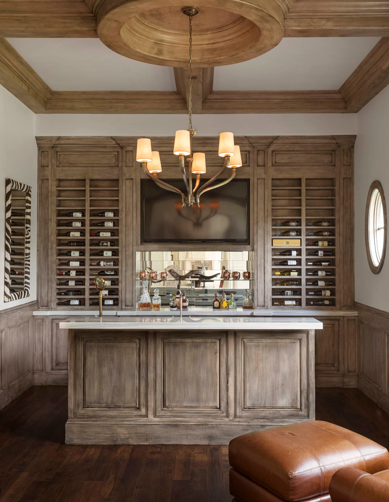 Inspiration for an expansive traditional galley wet bar in Dallas with open cabinets, medium wood cabinets, medium hardwood floors and mirror splashback.